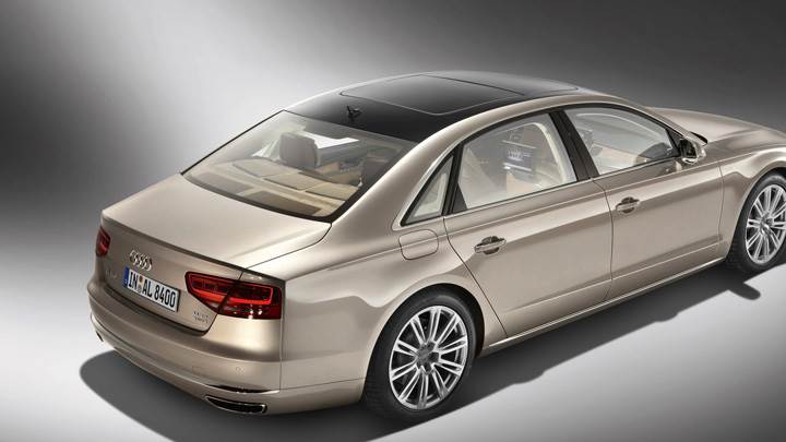 Side Back Pose Of 2011 Audi A8 L W12 Quattro In Golden